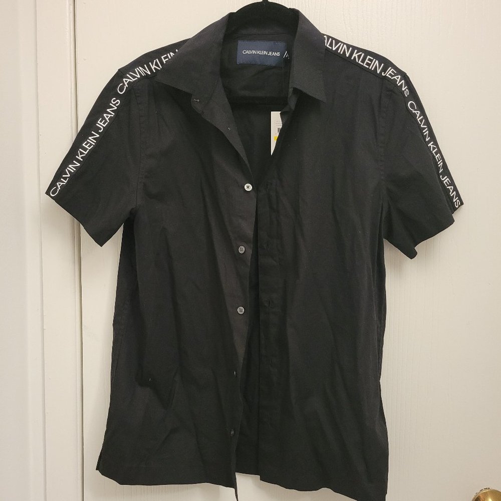 Calvin Klein black button-down with white lettering on shoulder sleeve